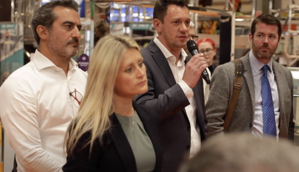 James asks the panel some questions after the documentary premier